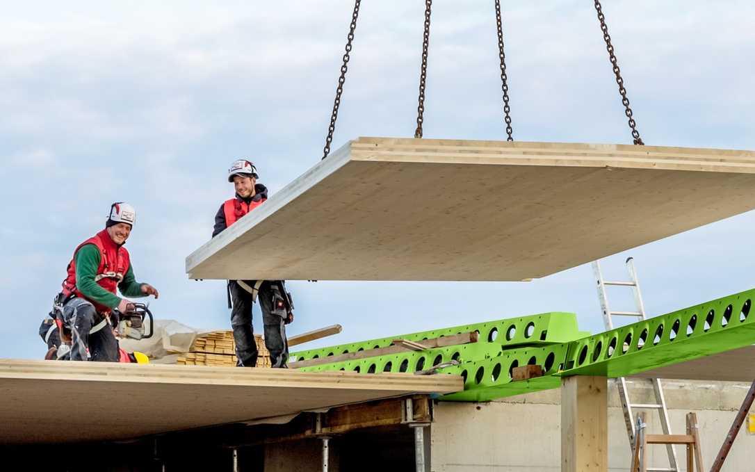 Peikko stellt CO2-reduzierten Stahl-Verbundträger für Flachdecken vor