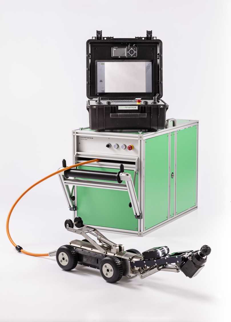 Das komplette eCutter light-System: kompakt, elektrisch und mobil – bestehend aus Roboter, Kabeltrommel und Bedienkoffer, alles transportfähig im Pkw. | Foto: Pipetronics Das komplette eCutter light-System: kompakt, elektrisch und mobil – bestehend aus Roboter, Kabeltrommel und Bedienkoffer, alles transportfähig im Pkw. | Foto: Pipetronics